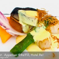 potobello mushroom in olive, marinated scallop, u.s. white asparagus and black truffle vinaigrette