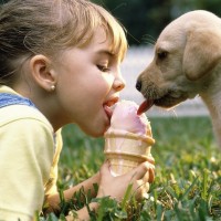 girl and puppy